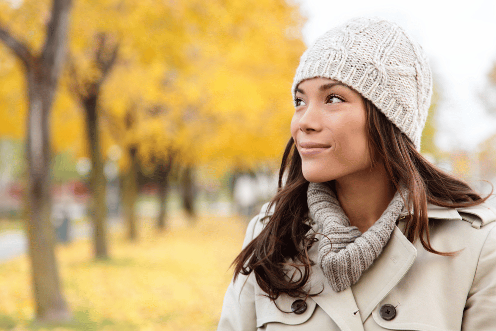 woman standing outside in the fall